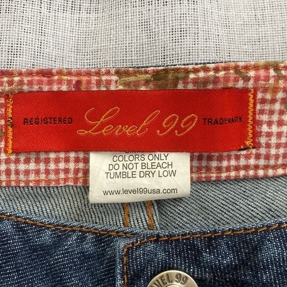 Level 99 flared leg darker denim jeans with rhinestone belt loops. - Picture 7 of 16